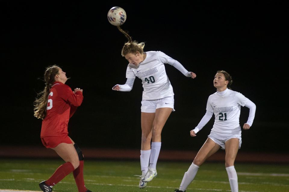 Pennridge junior Anna Croyle jumps to head the ball at Souderton Area High School on Wednesday, Nov. 16, 2022. Pennridge girls soccer defeated Neshaminy in PIAA semifinals 2-0. 