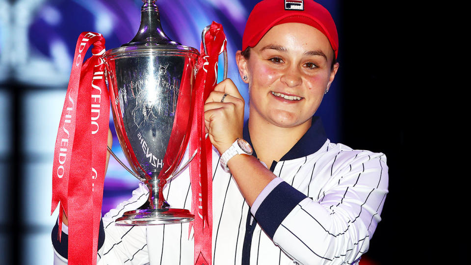 Ash Barty, pictured here with the trophy after winning the WTA Finals in 2019.