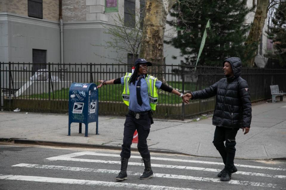 “The kids love when we have to cross that street, because [Bishop] dances and they just adore it,” pedestrian Lucero Sanchez said. Michael Nagle