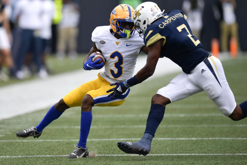 Georgia Tech defensive back Tariq Carpenter (2) hits Pittsburgh wide receiver Jordan Addison (3) during the first half of an NCAA college football game, Saturday, Oct. 2, 2021, in Atlanta. (AP Photo/Mike Stewart)