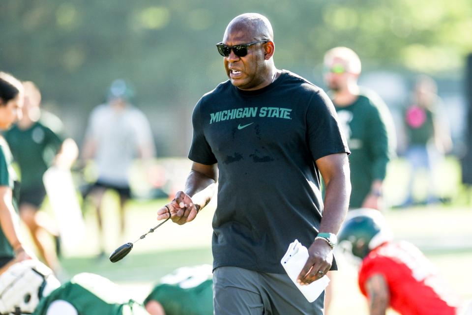 Michigan State's coach Mel Tucker calls out to players during the opening day of MSU's football fall camp on Thursday, Aug. 3, 2023, in East Lansing.