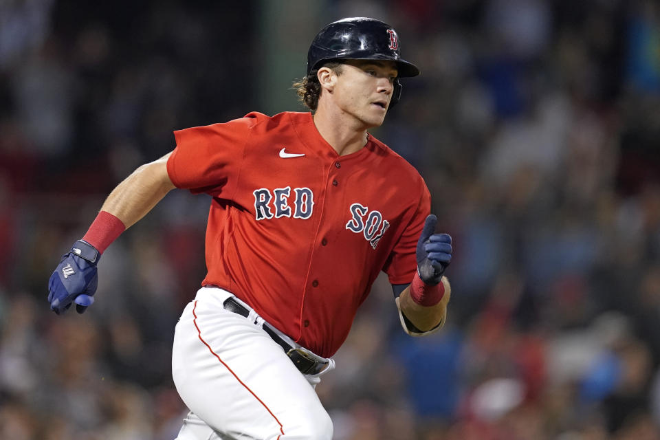 Boston Red Sox's Bobby Dalbec runs after hitting a two-run double in the sixth inning of a baseball game against the Houston Astros at Fenway Park, Thursday, June 10, 2021, in Boston. (AP Photo/Elise Amendola)