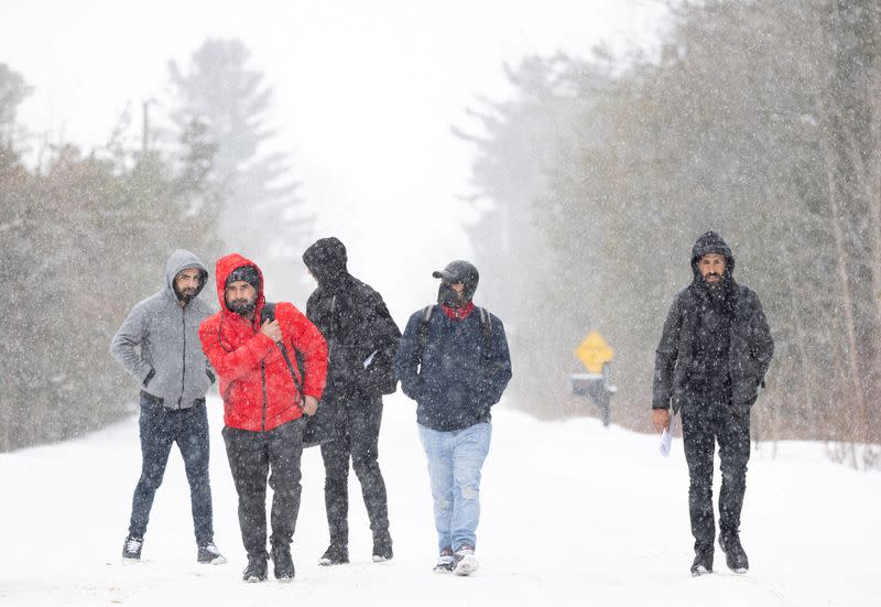 FILE PHOTO: Asylum seekers cross into Canada from Roxham Road in Champlain New York