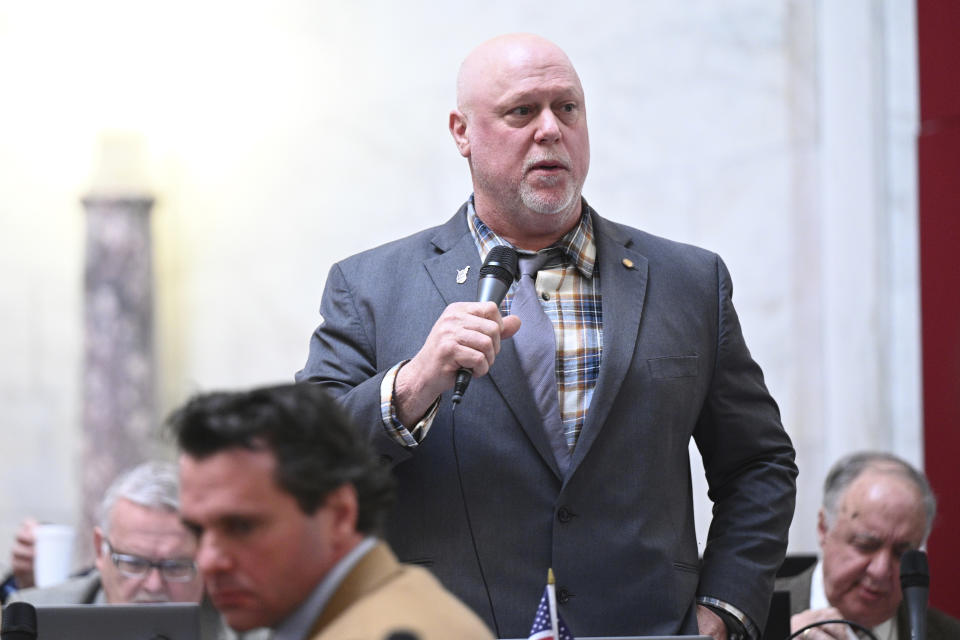 West Virginia Republican Del. Dave Foggin speaks during debate on the House of Delegates floor at the State Capitol in Charleston, W.Va., on Wednesday, Feb. 21, 2024. Foggin spoke in support of a bill that would allow K-12 teachers and other school staff with training to carry firearms and other weapons on public school grounds. (Perry Bennett/West Virginia Legislative Photography via AP)