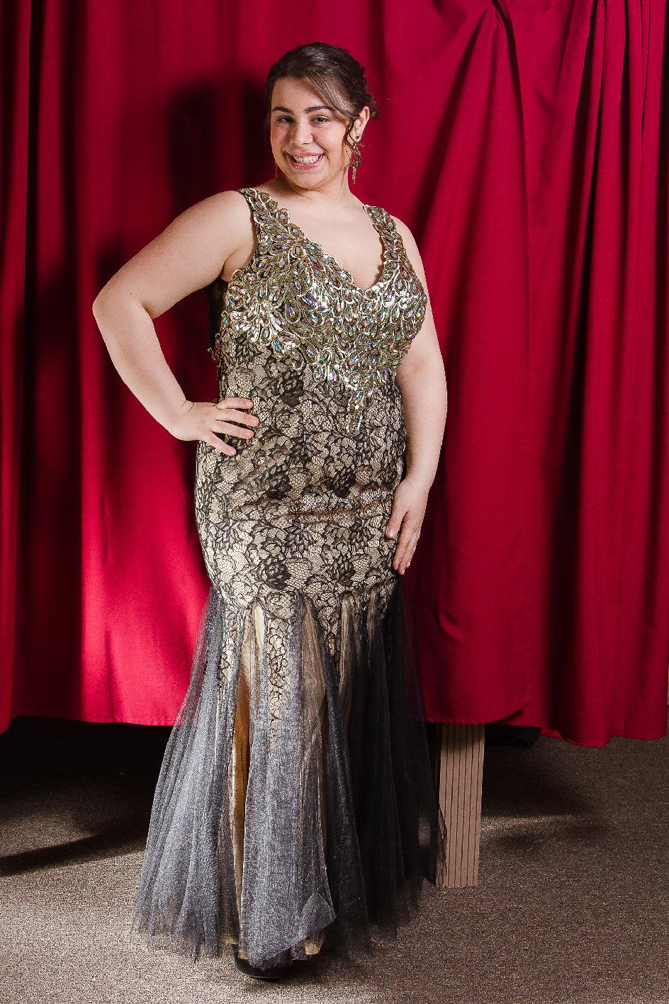 This undated image released by New York City Glitz shows Maria Giorno, 18, a high school senior from Manchester Township, N.J., models a prom dress at New York City Glitz boutique in Pine Beach, N.J. (AP Photo/New York City Glitz, Philip Shepherd)