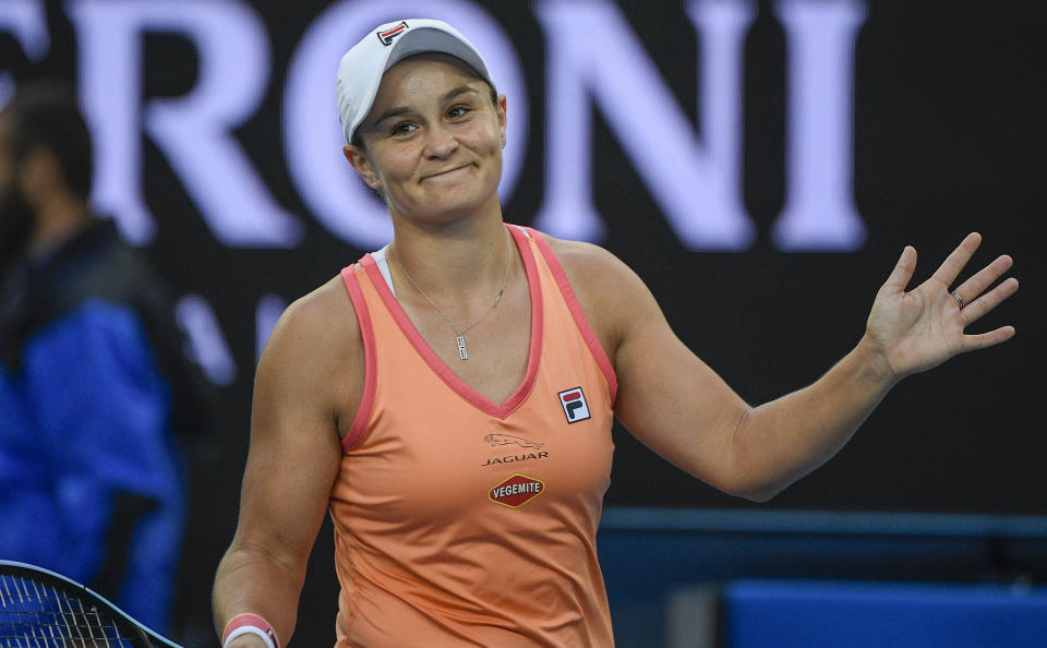 Australia's Ash Barty reacts after defeating Romania's Ana Bogdan in their match during a tuneup tournament ahead of the Australian Open tennis championships in Melbourne, Australia, Tuesday, Feb. 2, 2021. (AP Photo/Andrew Brownbill)