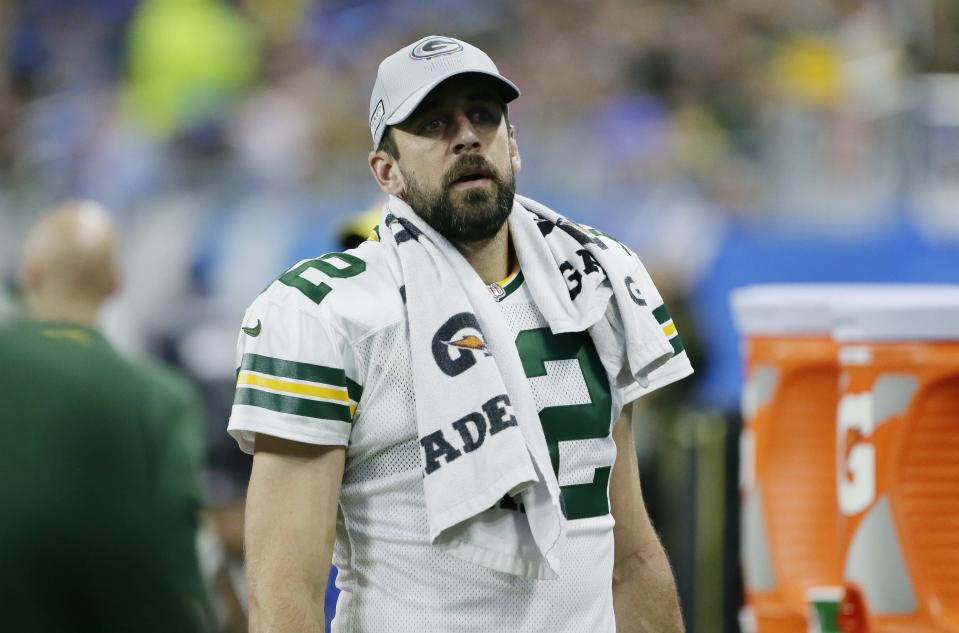 Green Bay Packers quarterback Aaron Rodgers walks in the bench area during the first half of an NFL football game against the Detroit Lions, Sunday, Oct. 7, 2018, in Detroit. (AP Photo/Duane Burleson)
