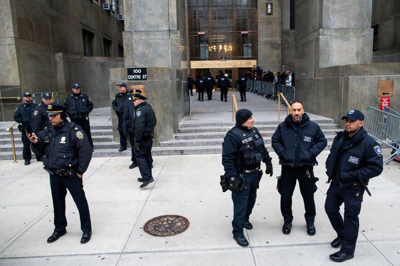 NYPD officers and NY court security police wait for the arrival of film producer Harvey Weinstein at New York Criminal Court for his sexual assault trial in the Manhattan borough of New York City