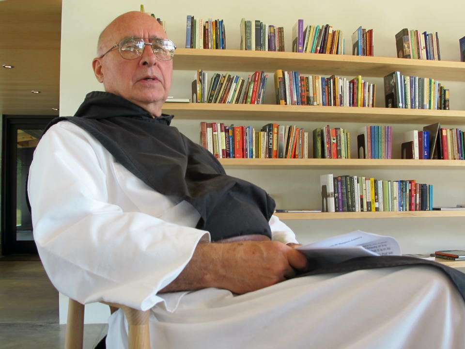 In this Oct. 30, 2013, Abbot Stan Gumula discusses recent additions at Mepkin Abbey during an interview at the abbey in Moncks Corner, S.C. The abbey hosts about 1,500 people a year who want to experience the contemplative life. (AP Photo/Bruce Smith)