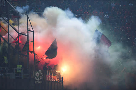 Football Soccer - Italy v Albania - World Cup 2018 Qualifiers - Group G - Renzo Barbera stadium, Palermo, Italy - 24/3/17. Albania's supporters light flares during the match. REUTERS/Alberto Lingria