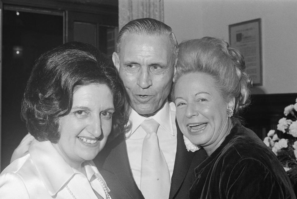 Martha Mitchell with the UPI's Helen Thomas and Thomas's husband, Douglas Cornell.