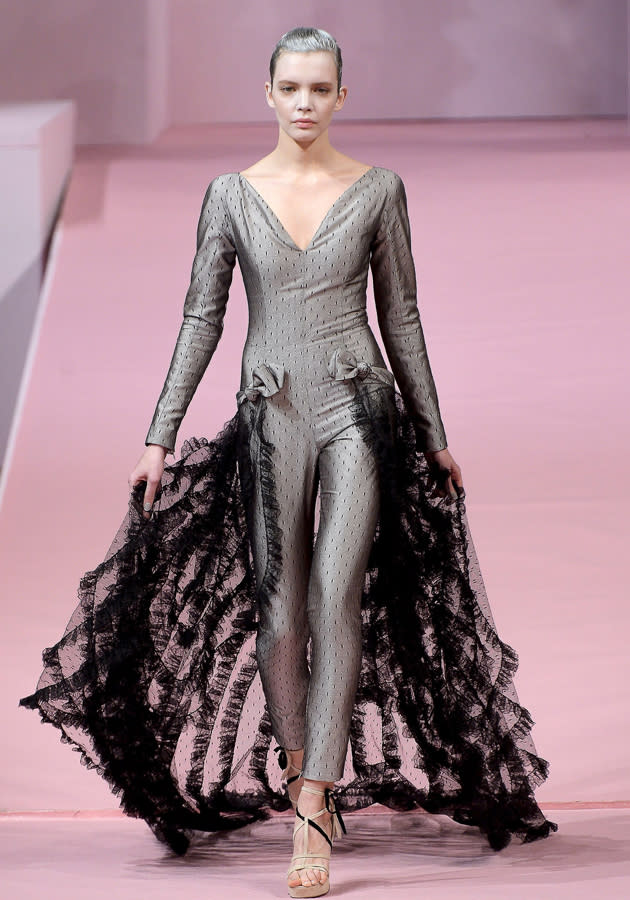 <b>Alexis Mabille Haute Couture SS13<br><br></b>This designer opted for futuristic fashion, with this off-the-wall silver jumpsuit and netted train.<b><br><br></b>© Rex