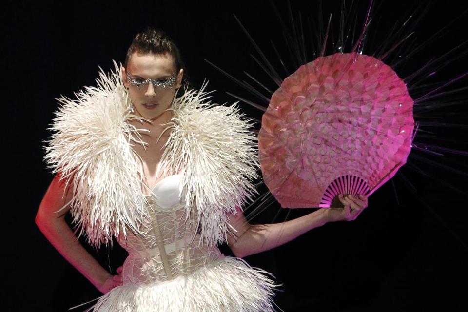 A model wears a creation by Belgian fashion designer Serkan Cura as part of his Spring-Summer 2014 Haute Couture fashion collection presentation, in Paris, Thursday, Jan.23, 2014. (AP Photo/Thibault Camus)