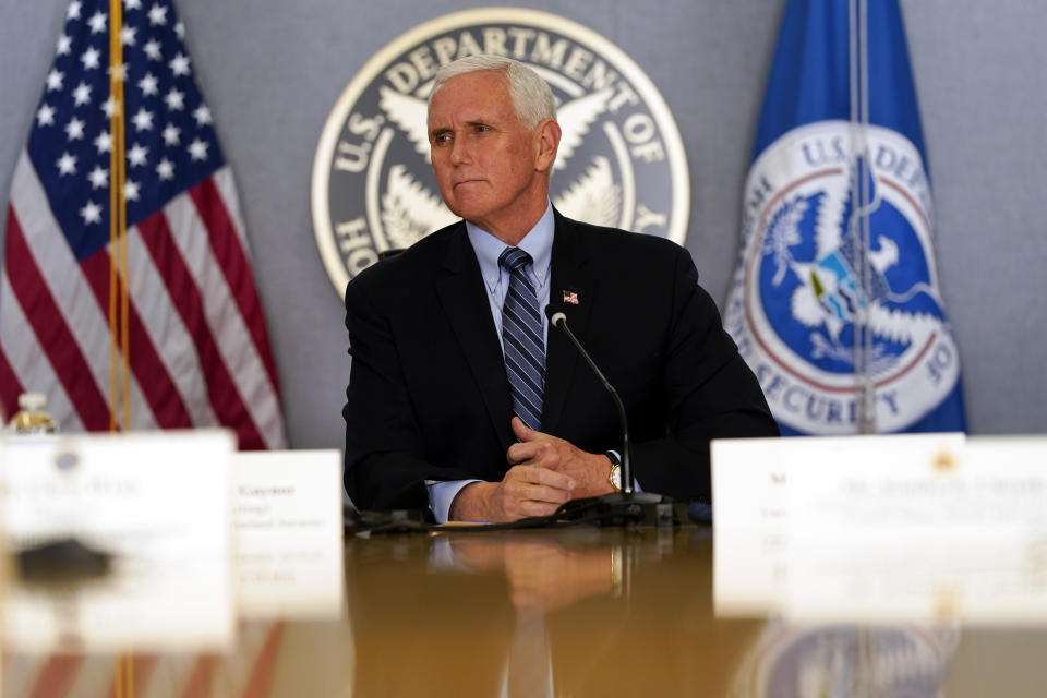 Vice President Mike Pence listens during a briefing about the upcoming presidential inauguration of President-elect Joe Biden and Vice President-elect Kamala Harris, at FEMA headquarters, Thursday, Jan. 14, 2021, in Washington. (AP Photo/Alex Brandon, Pool)