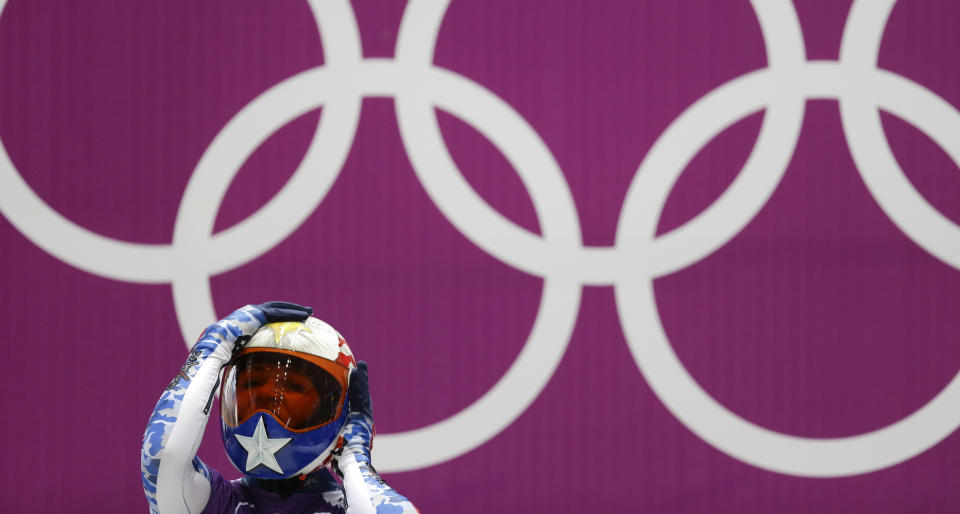 Katie Uhlaender of the United States prepares to start a training run for the women's skeleton during the 2014 Winter Olympics, Monday, Feb. 10, 2014, in Krasnaya Polyana, Russia. (AP Photo/Natacha Pisarenko)