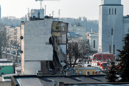 A partially collapsed apartment building is pictured after a gas explosion, which caused the death of four people, according to local media, in Poznan, Poland, March 4, 2018. Agencja Gazeta/Piotr Skornicki via REUTERS