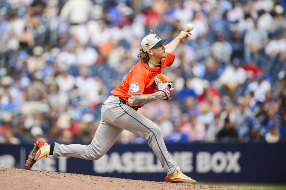 Houston Astros pitcher Josh Hader pitches against the Toronto Blue Jays during ninth-inning baseball game action in Toronto, Thursday, July 4, 2024. (Christopher Katsarov/The Canadian Press via AP)