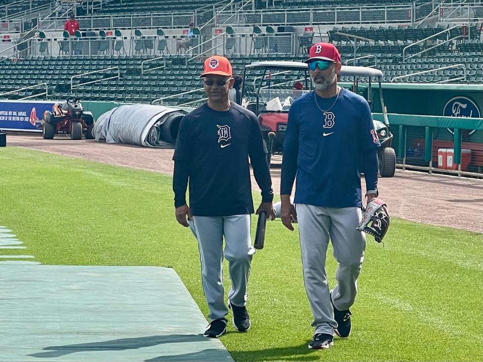 Detroit Tigers third base coach Joey Cora (left) and Boston Red Sox manager Alex Cora (right) at JetBlue Park at Fenway South on Feb. 29, 2024, in Fort Myers, Florida.