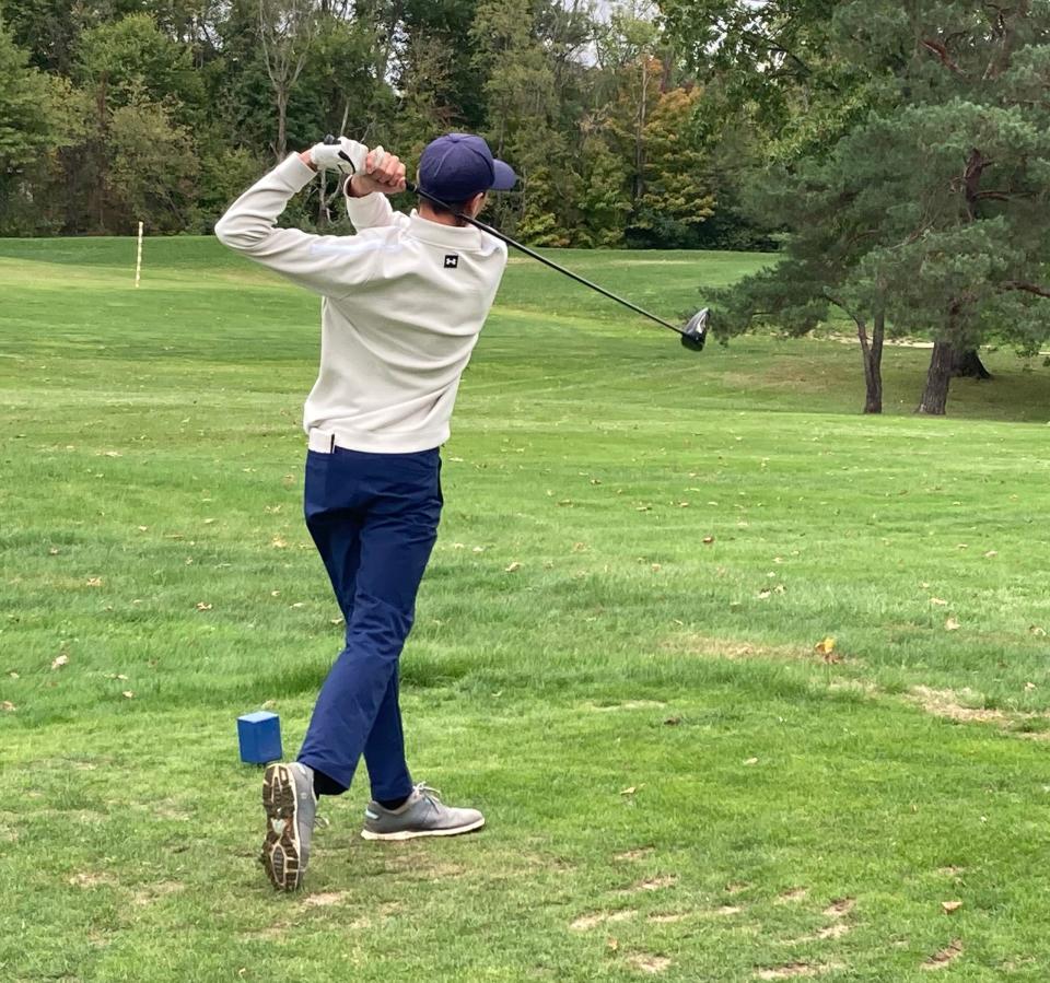 Jackson's Raffaele Scassa hits a tee shot Monday at the district tournament at Pine Hills Golf Club in Hinckley.