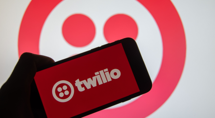 The brand logo of the US company "Twilio" on the display of a smartphone (focus on the brand logo), TWLO stock