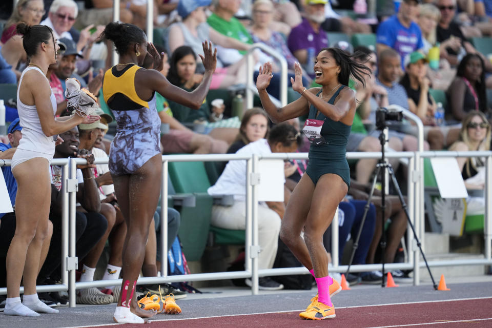 Tara Davis-Woodhall, celebrates after winning the women's long jump during the U.S. track and field championships in Eugene, Ore., Sunday, July 9, 2023. (AP Photo/Ashley Landis)