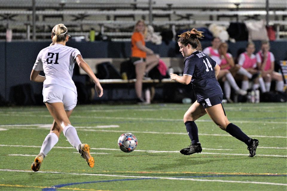 American Heritage's Isabella Larriu pushes the ball into the attacking half during the team's state semifinals contest. Larriu scored twice in the contest to lead the Stallions to the victory on Feb. 17, 2023.
