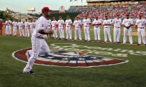 Los Angeles Angels' Albert Pujols runs out during introductions prior to a baseball game against the Kansas City Royals, Friday, April 6, 2012, in Anaheim, Calif. (AP Photo/Mark J. Terrill)