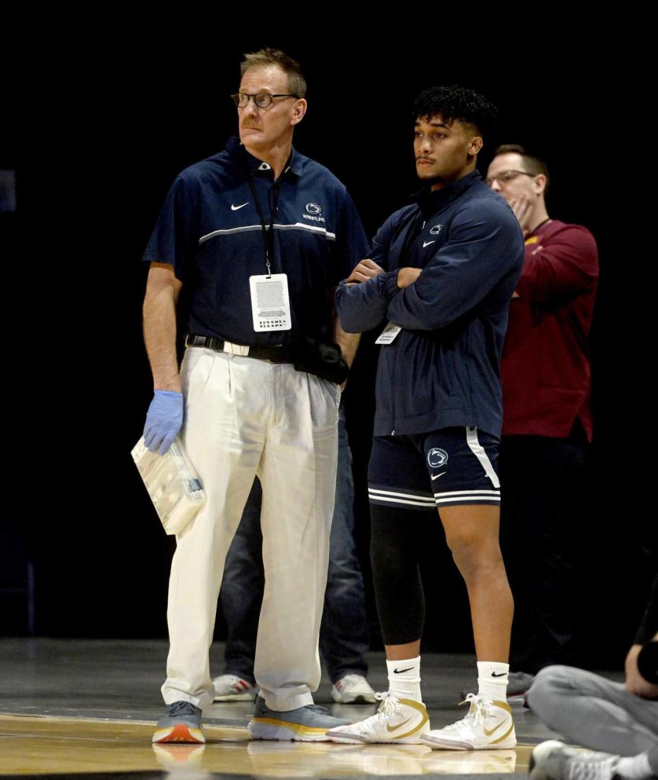 Penn State’s Carter Starocci stands with trainers at the Big Ten Wresting Championships at the Xfinity Center at the University of Maryland on Saturday, March 9, 2024.