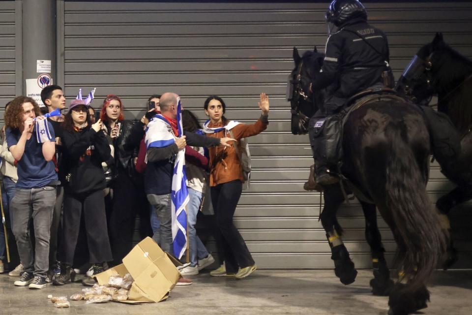 Horse-mounted police disperse protesters