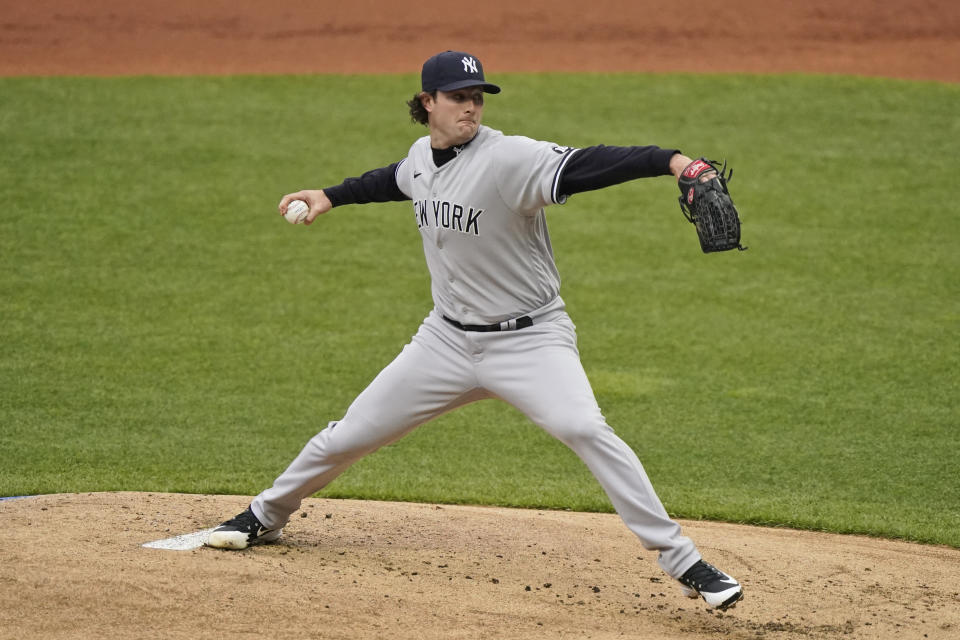 New York Yankees starting pitcher Gerrit Cole delivers in the first inning of a baseball game against the Cleveland Indians, Saturday, April 24, 2021, in Cleveland. (AP Photo/Tony Dejak)