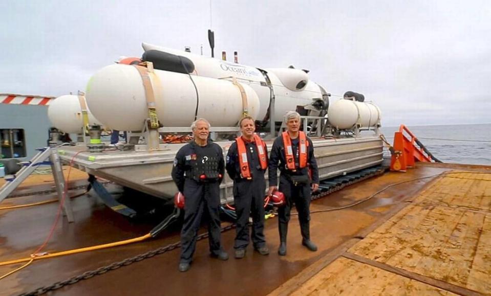 Paul-Henri “P.H.” Nargeolet, Scott Griffith and Stockton Rush pose for a photo after the Titan’s mission on July 23, 2021, the second one Bill Price was a mission specialist on.