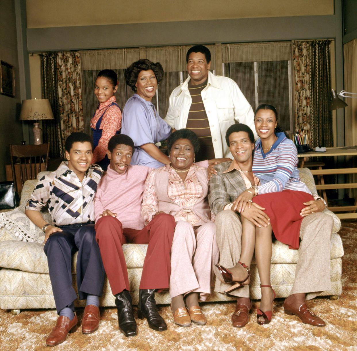 GOOD TIMES, (back row, l to r): Janet Jackson, Ja’net DuBois, Johnny Brown, (front): Ralph Carter, Jimmie Walker, Esther Rolle, Ben Powers, BernNadette Stanis, (Season 6), 1974-79. - Credit: CBS / Courtesy: Everett Collection