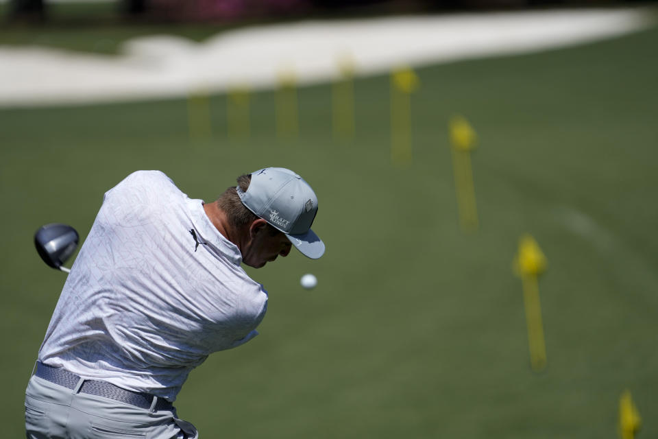 Bryson DeChambeau warms up on the range before a practice round for the Masters golf tournament on Monday, April 5, 2021, in Augusta, Ga. (AP Photo/David J. Phillip)