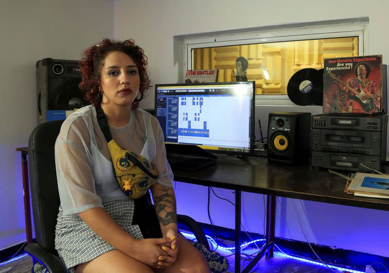 Moroccan rapper Houda Abouz, 24, known by her stage name "Khtek", attends an interview with Reuters inside a studio in Rabat