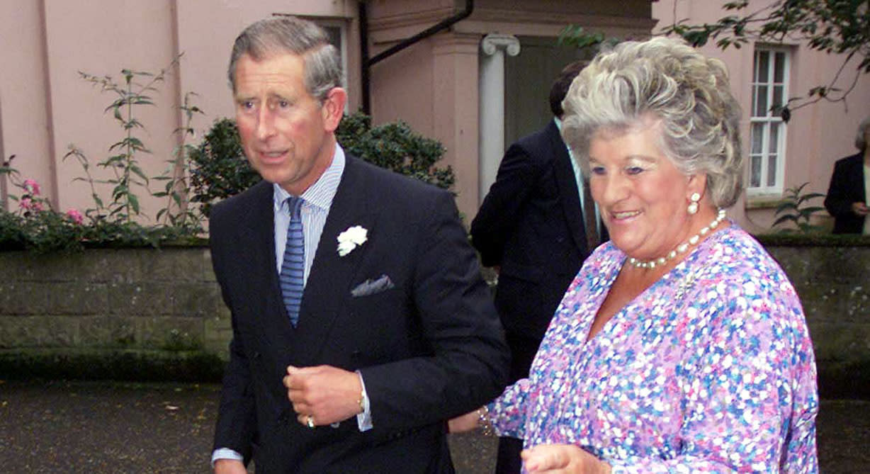 The Prince of Wales with Lady Mary Colman at a memorial service for the Queen mother at St. Andrews Church, Hingham, Norfolk. The Prince of Wales' partner Camilla Parker Bowles was tonight given the seal of approval by one of the royal families most stalwart supporters.   *Pensioner Mary Relph yelled "Welcome to Norfolk Camilla" as Mrs Parker Bowles arrived at a memorial concert for the Queen Mother with  Prince Charles. Mrs Parker Bowles walked over to speak to Mrs Relph, who has been watching the royal family at close quarters since she was a child, and was handed a bunch of yellow roses.