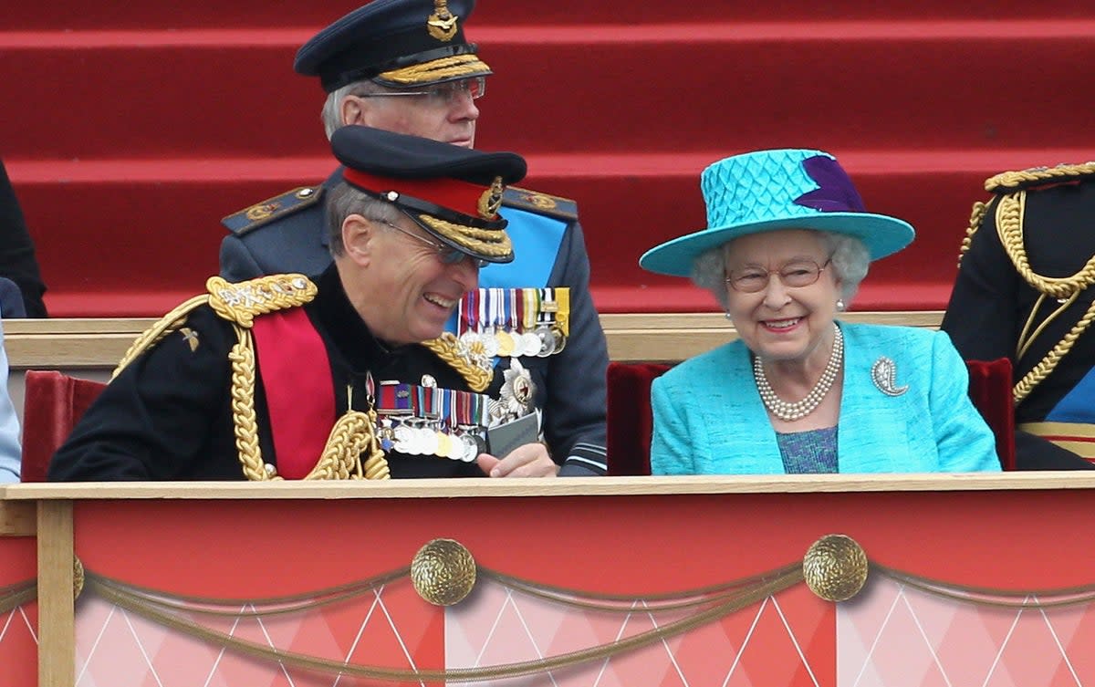 Lord Richards with the Queen in 2012 (PA)