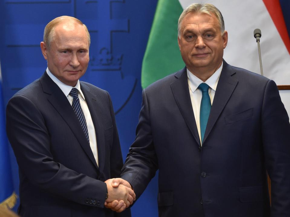 Russia’s Vladimir Putin and Hungary’s Viktor Orban shake hands after a meeting in Budapest in 2019 (Attila Kisbenedek/AFP via Getty Images)