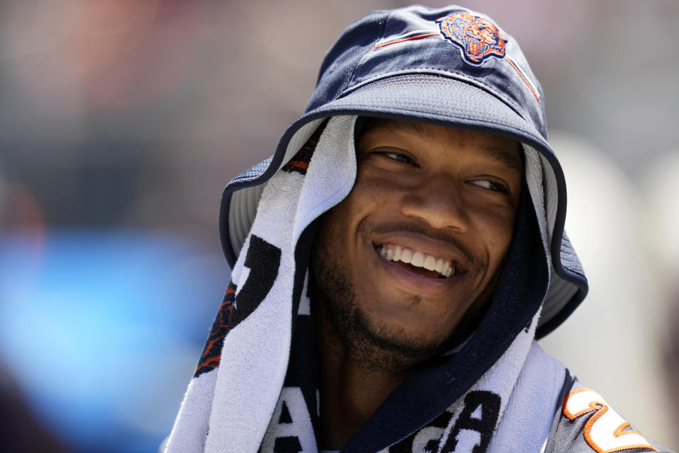 Chicago Bears wide receiver DJ Moore waves during the second half of an NFL preseason football game against the Tennessee Titans, Saturday, Aug. 12, 2023, in Chicago. (AP Photo/Charles Rex Arbogast)