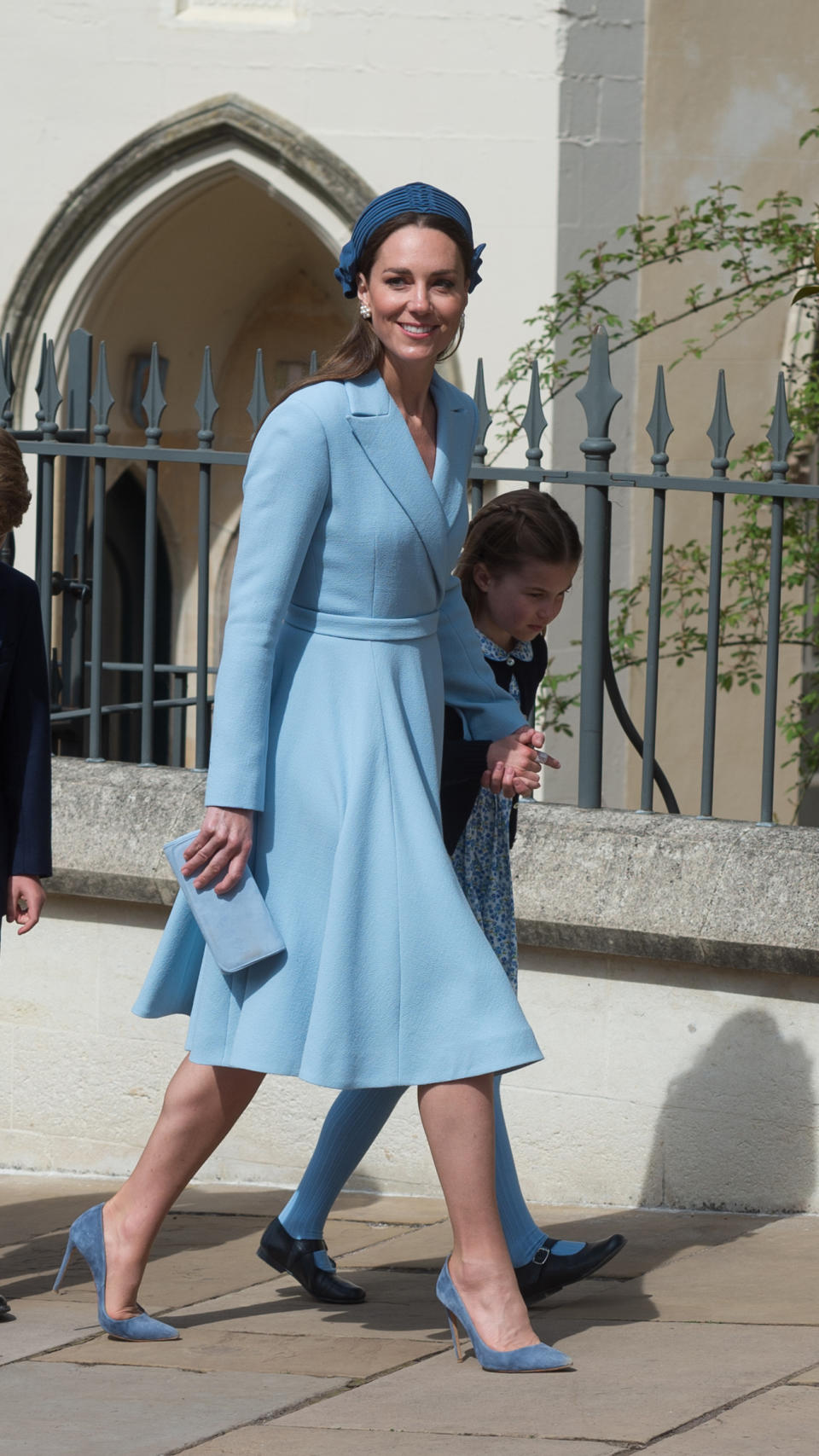 <p> While she’s a thoroughly modern member of the Royal family, Kate Middleton knows that timeless pieces such as a classic coat dress are a must-have, particularly when it comes to what to wear to a wedding or Christening. The fit and flare cut is a favourite and the Princess of Wales styles it to vintage perfection with head-to-toe colour-matched accessories including a pleated detail hat that sits on the crown of her head and allows her pearl cluster earrings to make a style statement. </p>