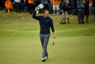 Golf - The 146th Open Championship - Royal Birkdale - Southport, Britain - July 23, 2017 USAÕs Jordan Spieth acknowledges the crowd after holing a putt on the 18th green to win The Open Championsip REUTERS/Hannah McKay