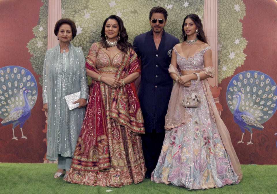 Bollywood actor Shah Rukh Khan and three women from his family at the newly married couple's blessing ceremony in Mumbai.