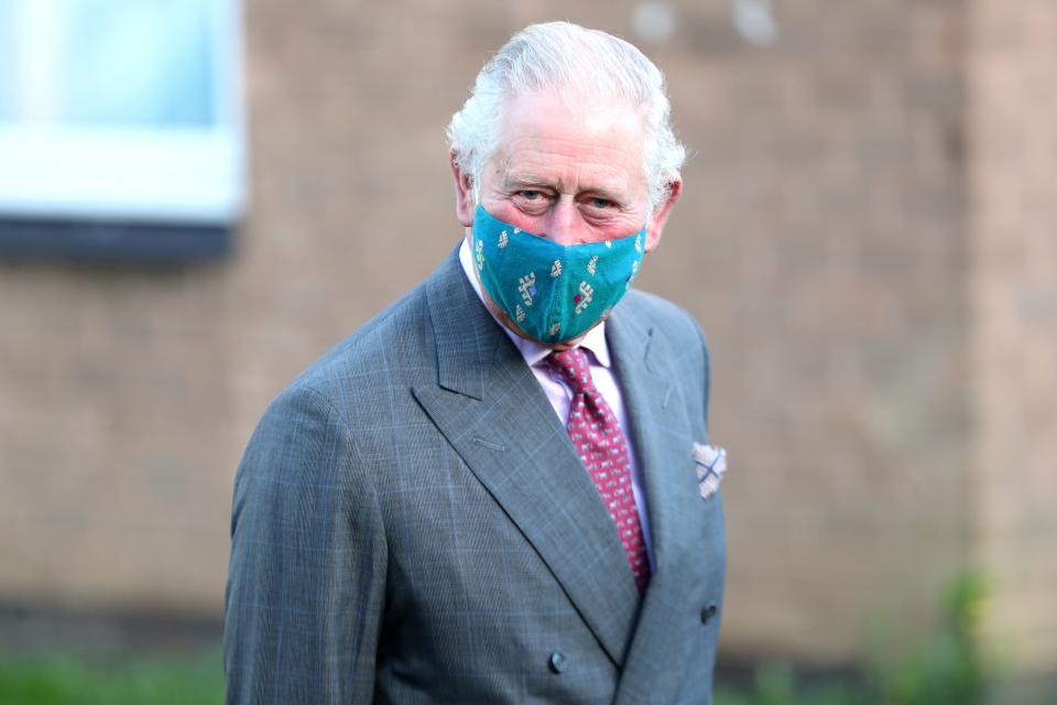 Britain's Prince Charles, Prince of Wales wearing a protective face covering to combat the spread of the coronavirus, visits the Gloucestershire Vaccination Centre at Gloucestershire Royal Hospital on December 17, 2020 in Gloucester, central England, to meet with front line health and care workers administering and receiving the Covid-19 vaccine. (Photo by Chris Jackson / POOL / AFP) (Photo by CHRIS JACKSON/POOL/AFP via Getty Images)