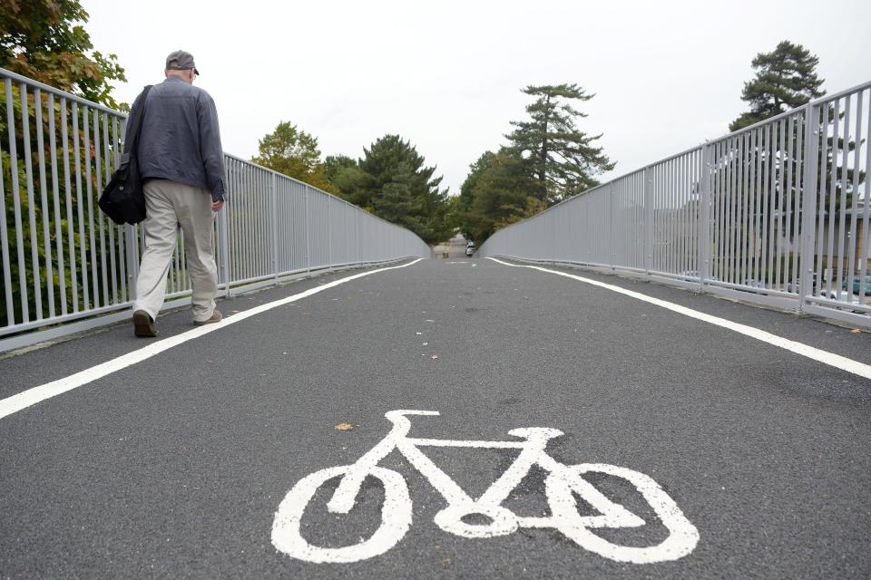 Problem: The giant cycle lane has made the pedestrian walkway 'too narrow' (SWNS)