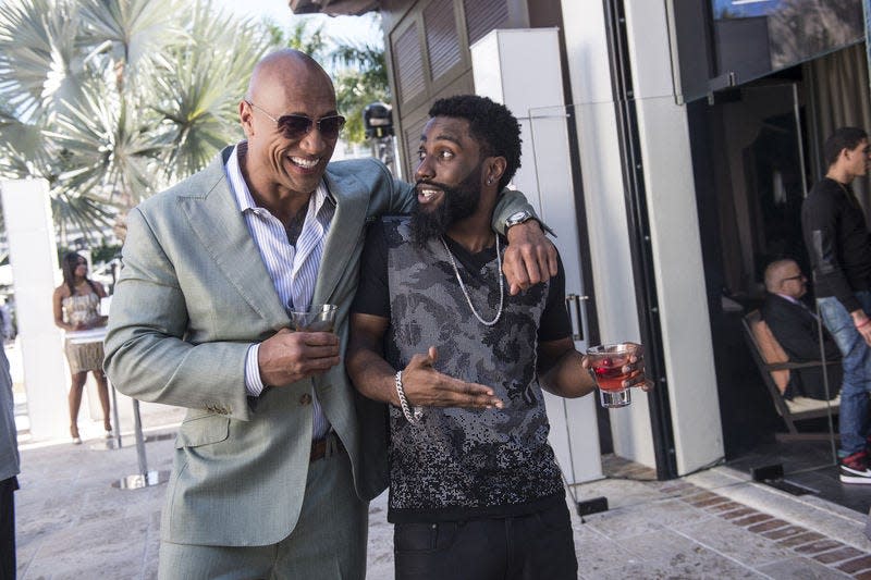 Dwayne Johnson, left, and John David Washington are shown in a scene from Episode 3 of “Ballers,” which premieres today on HBO.TNS Photo/HBO, JEFF DALY