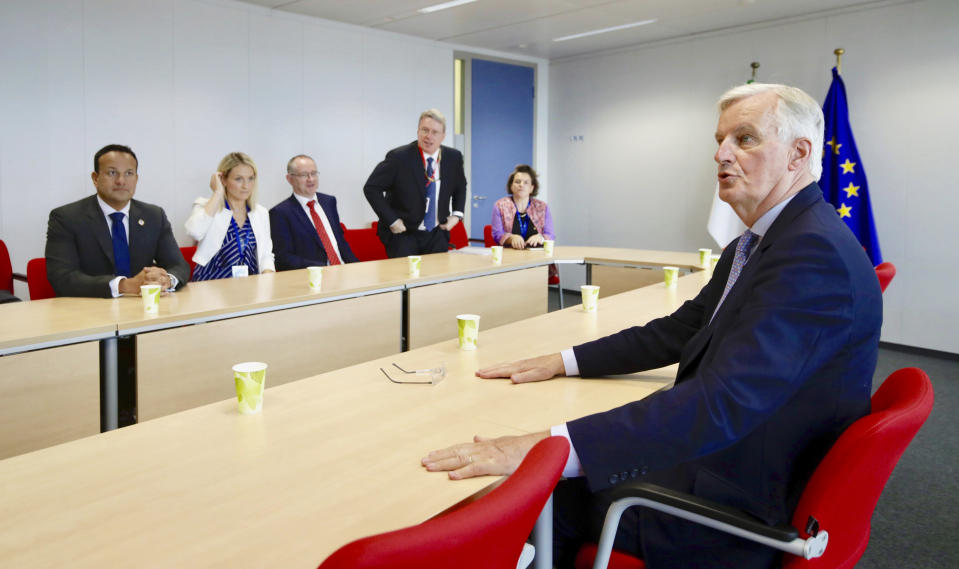 European Union chief Brexit negotiator Michel Barnier, right, meets with Irish Prime Minister Leo Varadkar , left, on the sidelines of an EU summit in Brussels, Thursday, June 20, 2019. European Union leaders meet in Brussels for a two-day summit to begin the process of finalizing candidates for the bloc's top jobs. (AP Photo/Olivier Matthys, Pool)