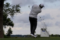 Scottie Scheffler hits his tee shot on the 17th hole during the completion of the weather delayed final round at the RBC Heritage golf tournament, Monday, April 22, 2024, in Hilton Head Island, S.C. (AP Photo/Chris Carlson)