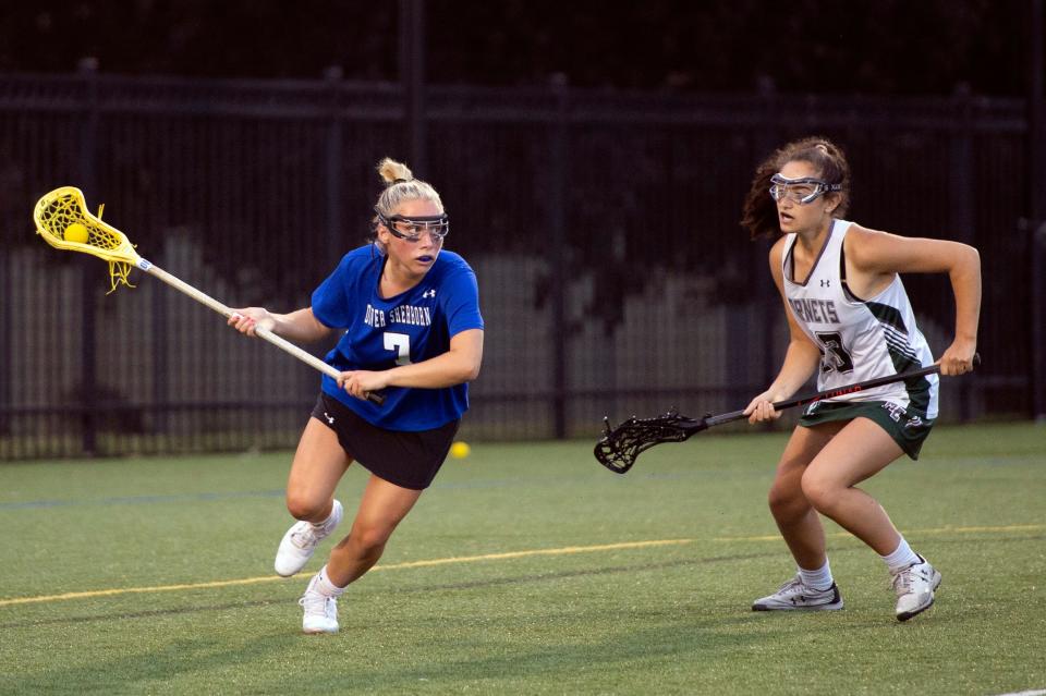Dover-Sherborn rising senior Sadie Mauro (left), seen here in the Division 4 state championship game against Manchester-Essex in 2022, was killed on July 21, 2023, after the boat she was riding in crashed into a jetty in East Dennis.