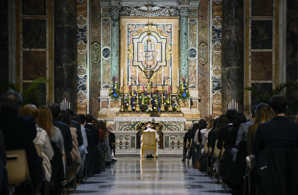 Pope Francis prays in the Gregorian Chapel in St. Peter's Basilica at the Vatican, Saturday, May 1, 2021. Pope Francis led a special prayer service Saturday evening to invoke the end of the pandemic. (Riccardo Antimiani/Pool photo via AP)