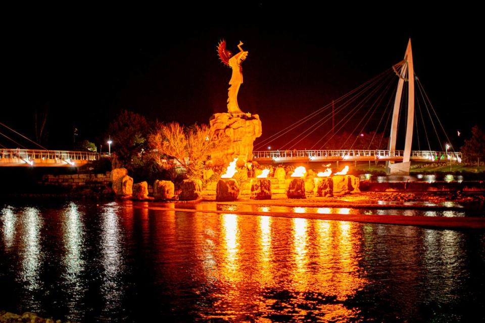 The Keeper of the Plains sculpture looks especially dramatic at night when its fire pots are lit.