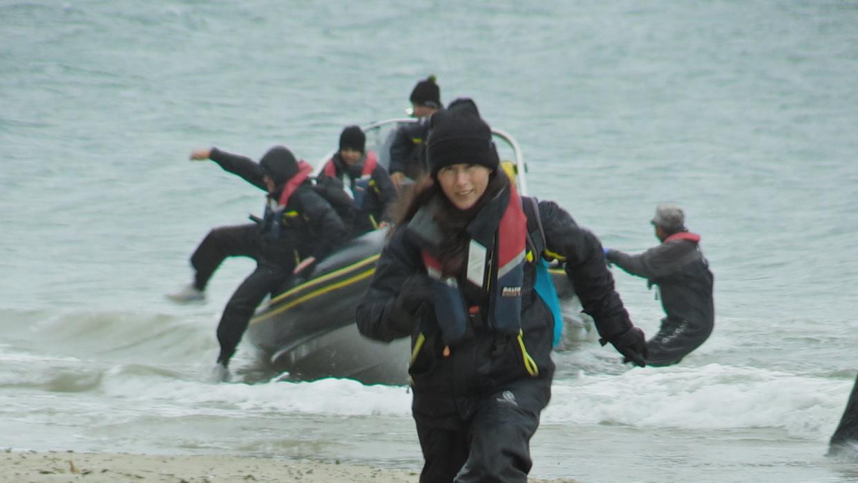 The contestants go on the run from a boat in the sea. (Channel 4)